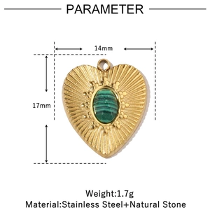 Detail showing a heart-shaped gold pendant with green malachite stone and dimensions