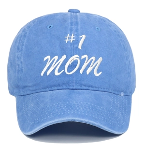 Macro view of #1 MOM embroidery on washed cotton vintage baseball cap texture