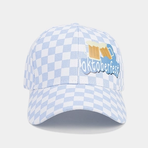 Detail of blue and white checkered baseball cap with Oktoberfest embroidery and beer icons