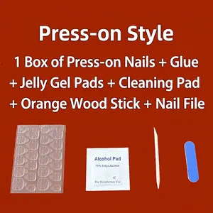 Press-on nail kit with adhesive tabs, alcohol prep pads, wood stick, and nail file