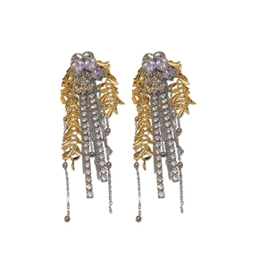 Elegant gold leaf earrings with silver chain tassels and sparkling rhinestones