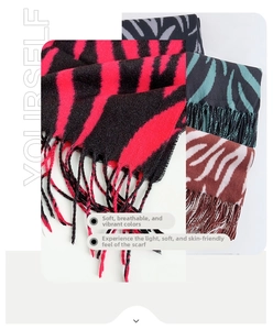 Close-up of zebra pattern winter scarves with tassel fringe in multiple color options