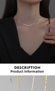 Detail of minimalist S925 silver necklace with flat round discs in gold and silver