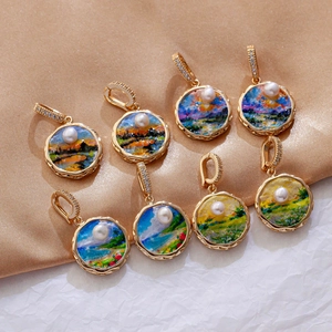Detailed macro of vintage style oil painting flower charms with gold rims and pearls