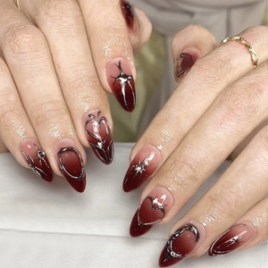 Gothic burgundy gradient press-on nails with silver metallic 3D heart and star designs