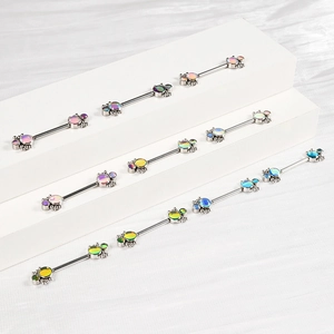 Polished stainless steel nipple rings with multi-color flower opal balls on white pedestals