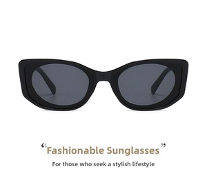 Detailed view of trendy oval cat-eye sunglasses with thick black frames and dark grey lenses