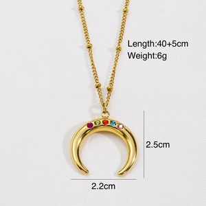 Detail of 14k gold crescent pendant necklace with colorful stones and 40+5cm chain size