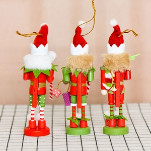 Three 13cm wooden Christmas nutcracker elf ornaments with red and green plush details