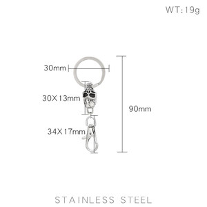Technical drawing of stainless steel skull keychain with precise dimensions and weight