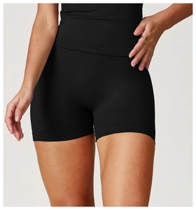 Close-up of seamless high waist black yoga shorts with tummy control compression fabric