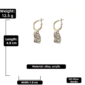 Detail of 925 silver acrylic earrings showing 4.8cm length and unique ice texture