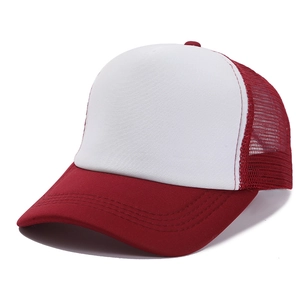 Close-up of red and white mesh trucker hat with breathable structure and clean stitching