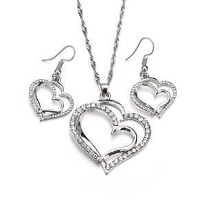 Hollow double heart jewelry set with necklace and earrings featuring white rhinestones