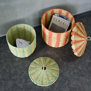 Two handmade rattan circus storage baskets with conical lids for toys and home decor
