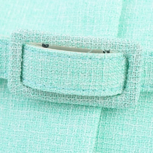 Gilet en tweed vert menthe avec boucle de ceinture recouverte de tissu et détail tissé