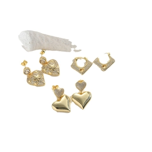 Elegant gold heart and star earrings set with crystals in a vintage French style