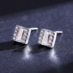 Elegant S925 silver stud earrings with emerald-cut zircon and halo stones in silver finish