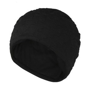 Unisex black knit beanie hat with textured grid pattern for winter warmth and protection