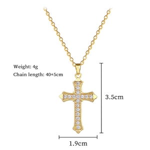 Detail view of gold cross necklace with zircon stones and size specifications 3.5cm