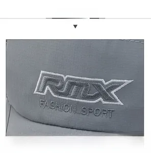 Detailed close-up of grey mesh baseball cap with premium RTX fashion sport embroidery