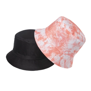Detail of classic black and pink tie-dye cotton bucket hats with reinforced stitching