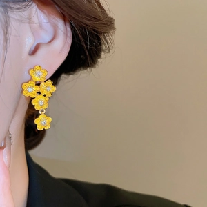 Elegant gold flower drop earrings with zircon crystals in a French vintage floral style
