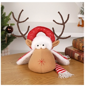 Detail of Christmas reindeer plush doll with red striped scarf and shiny sequin headband