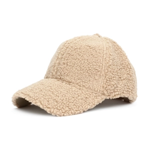 Detail of beige sherpa baseball cap showing soft grainy fleece texture and classic 6-panel design