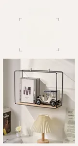 Macro detail of Nordic iron wall shelf with wooden base displaying books and decor
