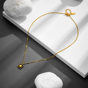 18K gold-plated titanium steel necklace with square black pendant and shell relief