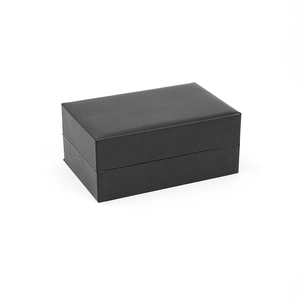 Premium black leather watch display box with flip-top lid and textured finish