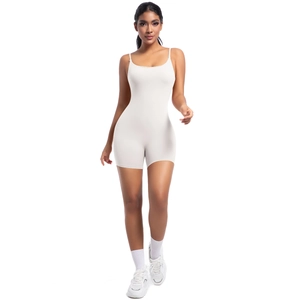 Close-up of seamless white yoga bodysuit with elastic fabric and slim-fit texture
