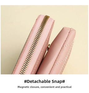 Detail of pink leather bag showing golden zipper and functional magnetic snap closure