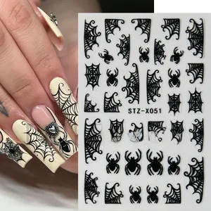 Detail of Halloween nail stickers STZ-X051 with black spider and web patterns on long nails