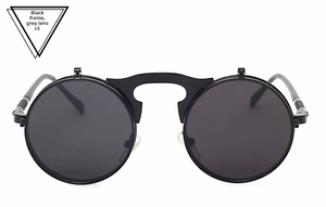 Detail view of steampunk round flip-up sunglasses with black metal frame and grey lenses
