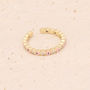 Macro shot of gold C-ring featuring pink evil eye enamel and sparkling zircons