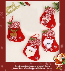Set of four red felt Christmas stockings featuring Santa, Snowman, Reindeer and Polar Bear