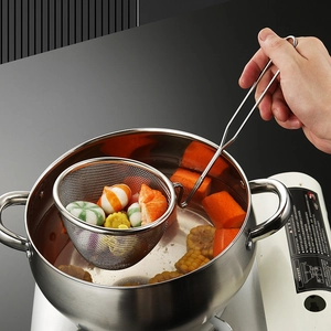 304 stainless steel hot pot ladle strainer with hook handle scooping food from boiling pot