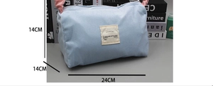 Detailed size view of light blue corduroy vanity bag with beige label, 24x14x14cm dimensions