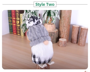 Detail of Style 2 Christmas gnome doll featuring a gray knit hat and plaid body decor