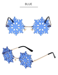 Detail view of blue snowflake rimless sunglasses with metal frame for party wear