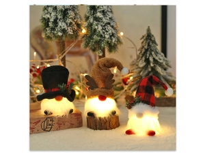 Three glowing Christmas gnomes with hat designs hanging on a festive tree background