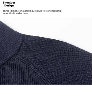 Macro detail of high-quality navy blue knit fabric stitching on men's shoulder