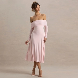 Detail of elegant off-the-shoulder long sleeve light pink midi dress in soft knit fabric