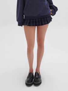 Navy blue hoodie paired with a dark plaid pleated mini skirt and black loafers set