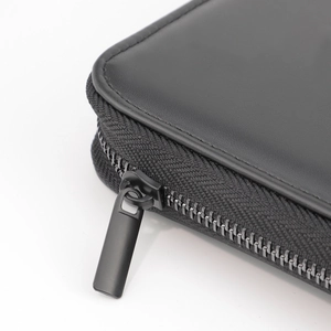 Trousse à pinceaux maquillage en cuir PU noir portable avec fermeture éclair noire mate