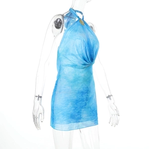Detail of blue tie-dye halter neck mini dress with pleated neckline and sheer fabric texture