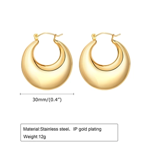 Detail view of 30mm gold hollow stainless steel hoop earrings with IP plating