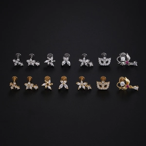 Flat back stainless steel lip and cartilage studs with butterfly and flower crystal designs